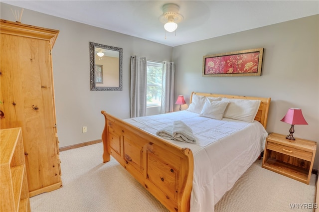 26 Pine Tree Village Rd Unit 26, Ellicottville, NY 14731 - bedroom with light carpet, baseboards, and a ceiling fan