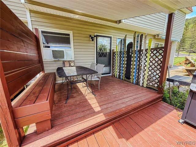 26 Pine Tree Village Rd Unit 26, Ellicottville, NY 14731 - wooden deck with outdoor dining space and cooling unit
