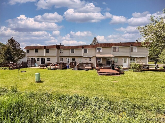 26 Pine Tree Village Rd Unit 26, Ellicottville, NY 14731 - back of property with a wooden deck