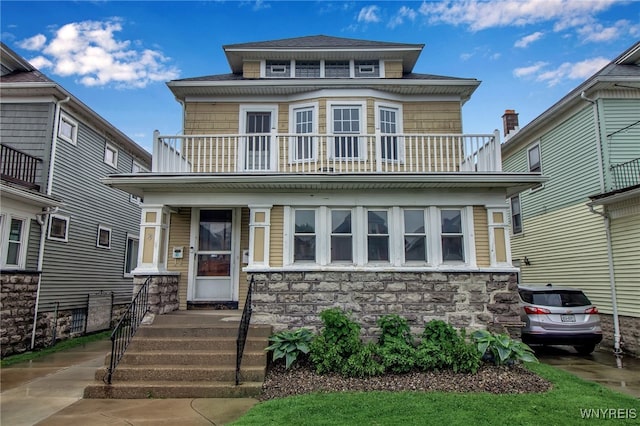 75 N Park Ave, Buffalo, NY 14216 - traditional style home with a balcony, stone siding, and a shingled roof