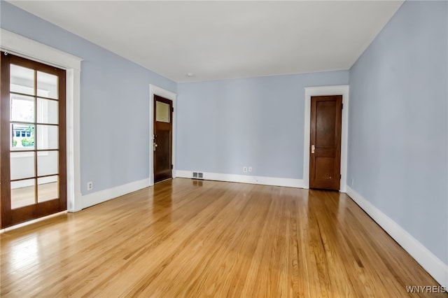 75 N Park Ave, Buffalo, NY 14216 - empty room featuring light wood-style floors and baseboards