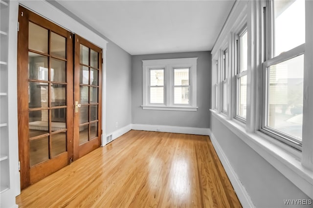 75 N Park Ave, Buffalo, NY 14216 - unfurnished sunroom featuring french doors