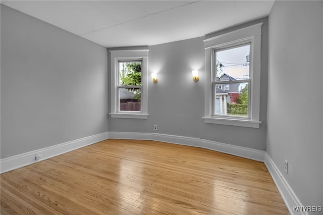 75 N Park Ave, Buffalo, NY 14216 - empty room featuring light wood-style floors and baseboards