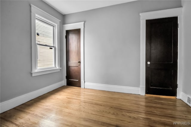 75 N Park Ave, Buffalo, NY 14216 - empty room featuring baseboards and light wood-style flooring