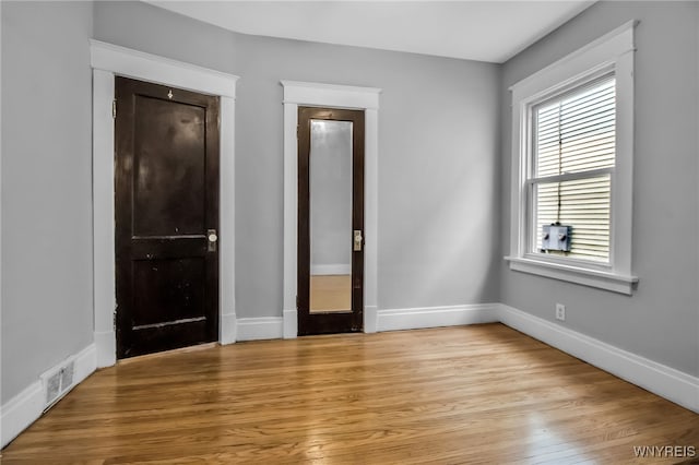 75 N Park Ave, Buffalo, NY 14216 - unfurnished bedroom with baseboards and light wood-type flooring