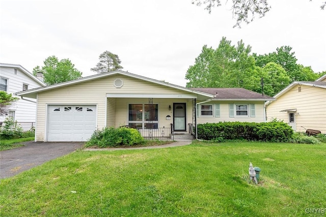 219 Longmeadow Dr, Syracuse, NY 13205 - ranch-style home featuring covered porch, asphalt driveway, a garage, and a front lawn