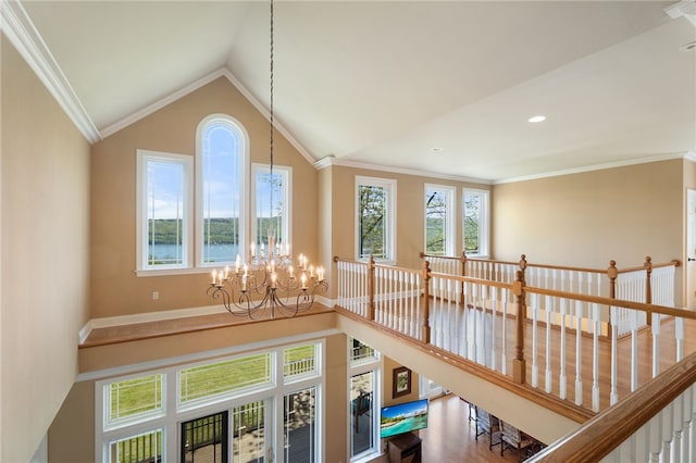 436 Steuben St, Reading, NY 14891 - hallway featuring a chandelier, wood finished floors, lofted ceiling, ornamental molding, and baseboards