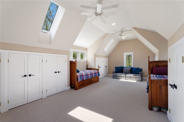 436 Steuben St, Reading, NY 14891 - carpeted bedroom with a skylight, two closets, lofted ceiling, and ceiling fan
