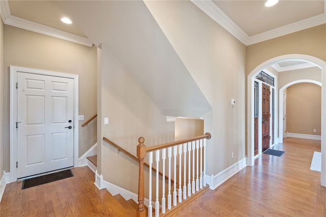 436 Steuben St, Reading, NY 14891 - entryway featuring wood finished floors, arched walkways, crown molding, baseboards, and recessed lighting