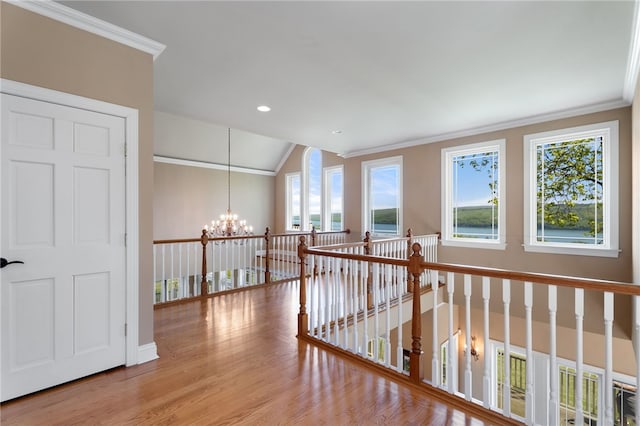 436 Steuben St, Reading, NY 14891 - hallway with a chandelier, crown molding, wood finished floors, lofted ceiling, and recessed lighting