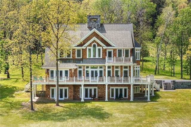 436 Steuben St, Reading, NY 14891 - back of property featuring french doors, a lawn, a balcony, and a deck