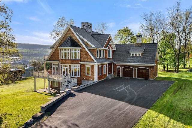 436 Steuben St, Reading, NY 14891 - shingle-style home featuring driveway, a wooden deck, an attached garage, roof with shingles, and a front lawn