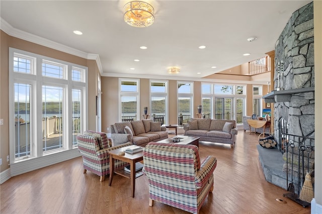 436 Steuben St, Reading, NY 14891 - living room featuring ornamental molding, a fireplace, recessed lighting, and wood finished floors