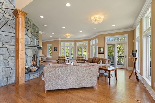436 Steuben St, Reading, NY 14891 - living area with a stone fireplace, light wood-type flooring, ornamental molding, baseboards, and recessed lighting
