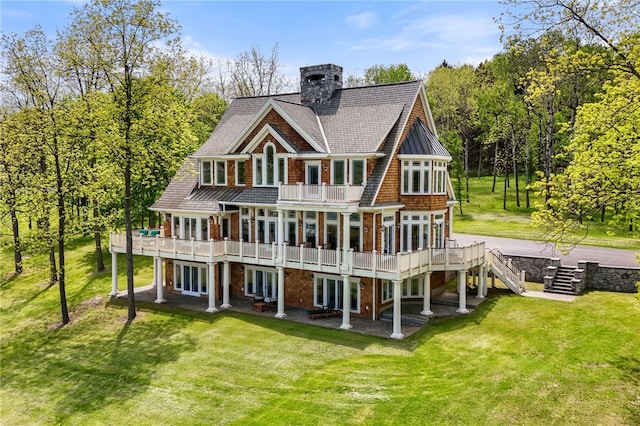 436 Steuben St, Reading, NY 14891 - back of house featuring stairway, a lawn, a patio area, and a balcony