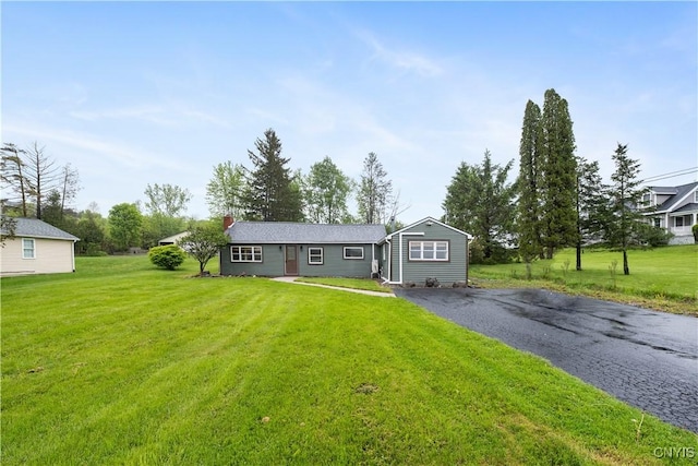 3583 W Seneca Tpke, Onondaga, NY 13215 - view of front of property featuring a front lawn and a chimney
