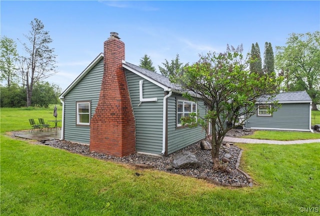 3583 W Seneca Tpke, Onondaga, NY 13215 - view of property exterior featuring a lawn and a chimney