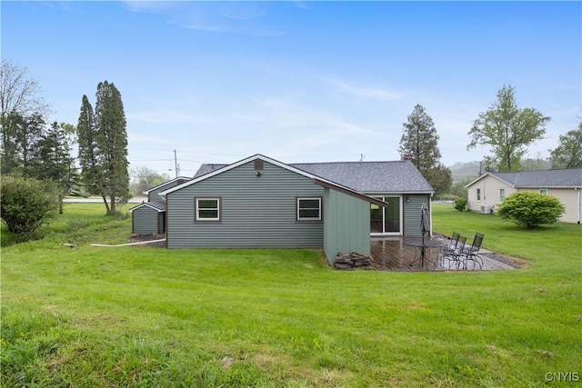3583 W Seneca Tpke, Onondaga, NY 13215 - rear view of house featuring a lawn and a patio area
