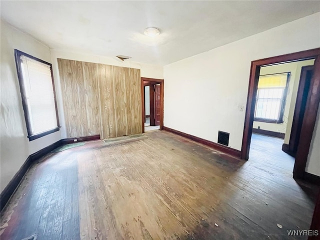 497-499 Riley St, Buffalo, NY 14208 - spare room featuring wood finished floors and baseboards