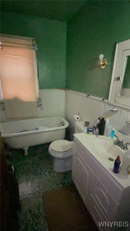 497-499 Riley St, Buffalo, NY 14208 - bathroom with toilet, vanity, and wainscoting