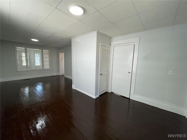 28 Boyd St, Buffalo, NY 14213 - spare room with baseboards, hardwood / wood-style floors, and a paneled ceiling