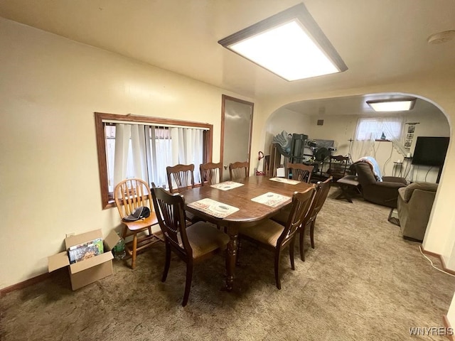 28 Boyd St, Buffalo, NY 14213 - dining space with arched walkways and carpet floors