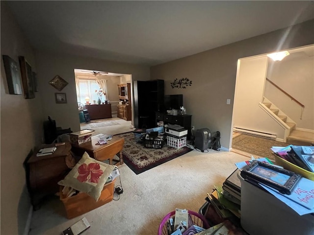 441 Center St, Geddes, NY 13209 - carpeted living area featuring baseboard heating and stairs