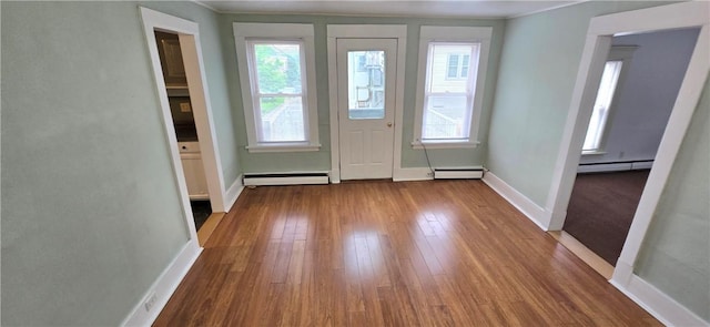104 Main St, Stamford, NY 12167 - entryway with a baseboard heating unit, healthy amount of natural light, and dark wood-type flooring
