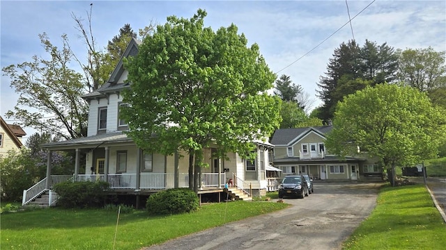 104 Main St, Stamford, NY 12167 - view of front of home with a porch and a front yard