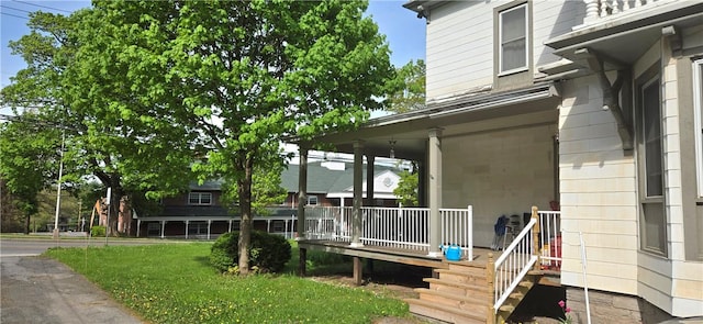 104 Main St, Stamford, NY 12167 - property entrance with covered porch and a yard