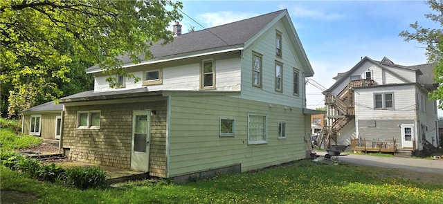 104 Main St, Stamford, NY 12167 - view of side of property with a chimney and a yard
