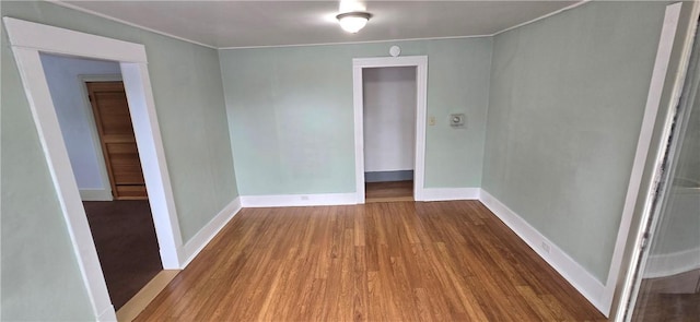 104 Main St, Stamford, NY 12167 - unfurnished room featuring wood finished floors, crown molding, and baseboards