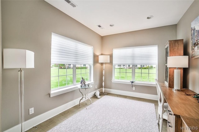 5692 Ferncrest Ct Unit B, Clarence, NY 14032 - office space featuring plenty of natural light, baseboards, recessed lighting, and wood finished floors