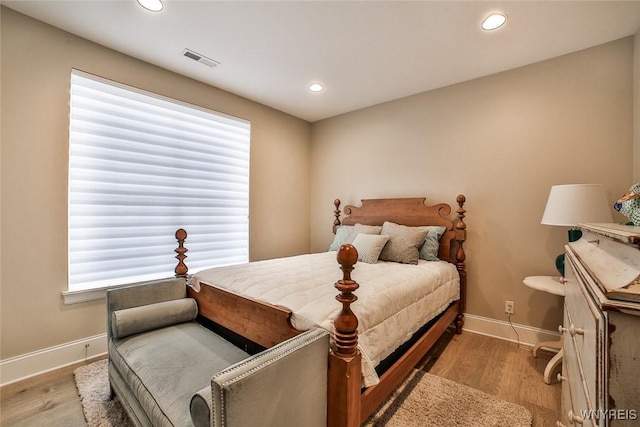 5692 Ferncrest Ct Unit B, Clarence, NY 14032 - bedroom with baseboards, recessed lighting, and light wood-type flooring