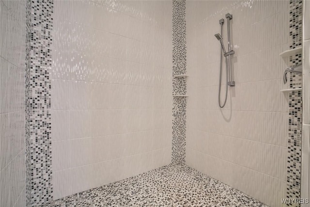 5692 Ferncrest Ct Unit B, Clarence, NY 14032 - bathroom featuring tiled shower