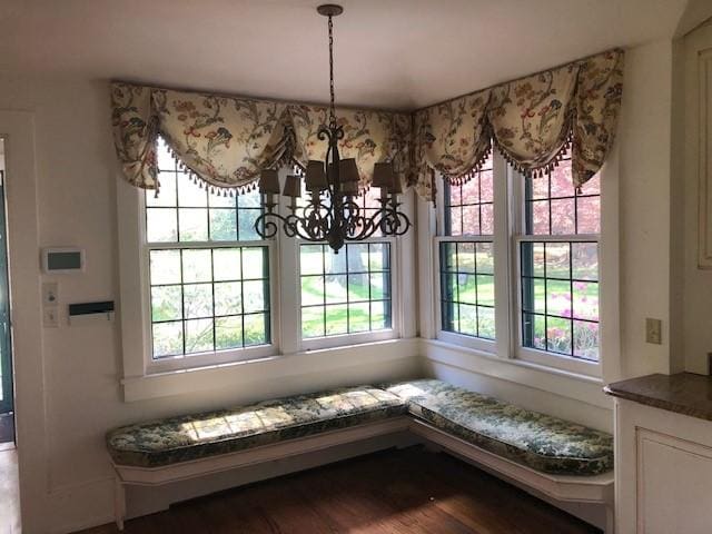 700 Rock Beach Rd, Irondequoit, NY 14617 - dining space with a chandelier and wood finished floors