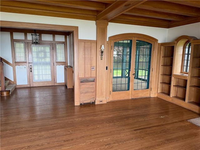 700 Rock Beach Rd, Irondequoit, NY 14617 - foyer entrance with french doors, wood finished floors, beamed ceiling, stairway, and arched walkways