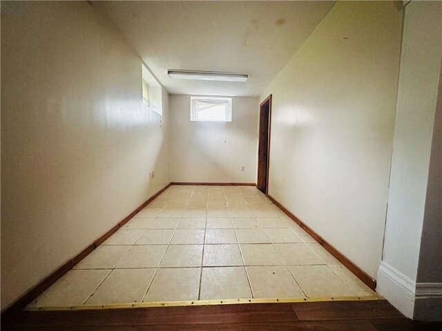 218 Grant St, Elmira-City, NY 14901 - basement featuring baseboards and light tile patterned flooring