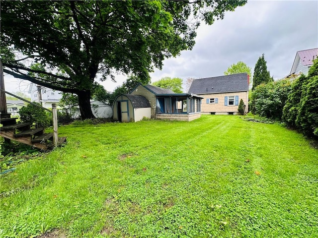 218 Grant St, Elmira-City, NY 14901 - view of grassy yard featuring a sunroom
