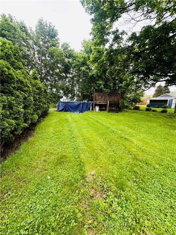 218 Grant St, Elmira-City, NY 14901 - view of green lawn featuring a wooden deck