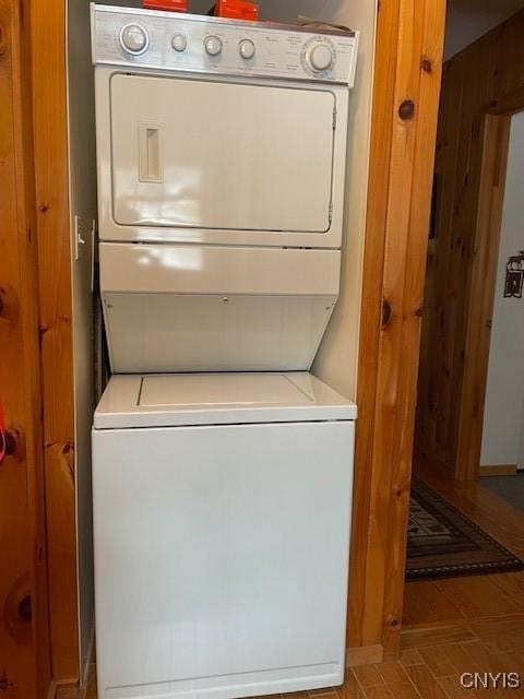 103 Onondaga Rd, Webb, NY 13420 - laundry room featuring stacked washer / dryer
