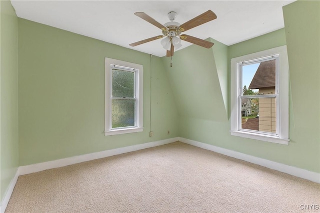 10 Garfield St Unit 10, Cortland, NY 13045 - carpeted empty room with baseboards and a ceiling fan