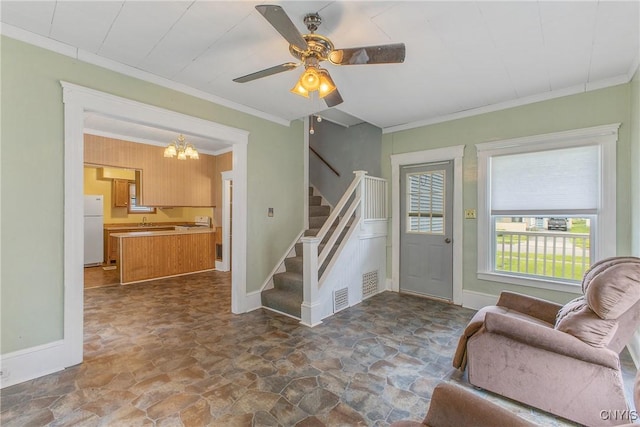 10 Garfield St Unit 10, Cortland, NY 13045 - foyer entrance with dark stone finish floors, ornamental molding, stairway, a chandelier, and a ceiling fan