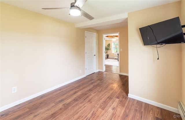 8929 State Route 12e, Lyme, NY 13622 - unfurnished room with a ceiling fan, wood finished floors, baseboards, and baseboard heating