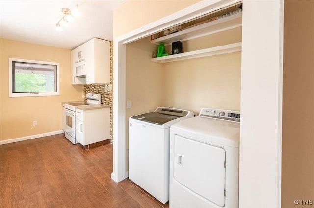 8929 State Route 12e, Lyme, NY 13622 - laundry area featuring washing machine and clothes dryer, wood finished floors, and baseboards