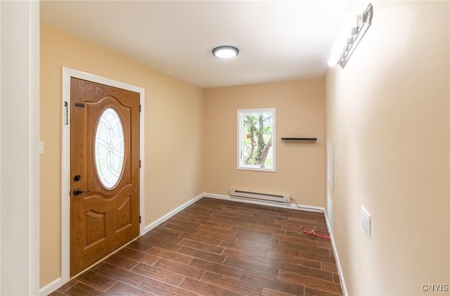 8929 State Route 12e, Lyme, NY 13622 - entryway featuring a baseboard heating unit, dark wood finished floors, and baseboards