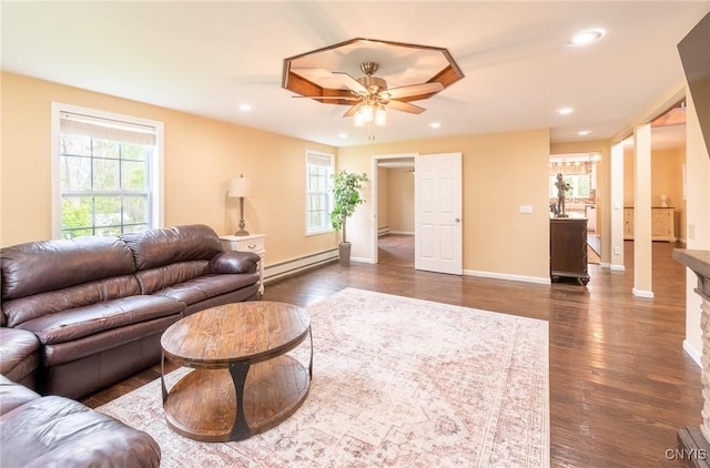 8929 State Route 12e, Lyme, NY 13622 - living room featuring baseboard heating, dark wood-type flooring, recessed lighting, and a ceiling fan