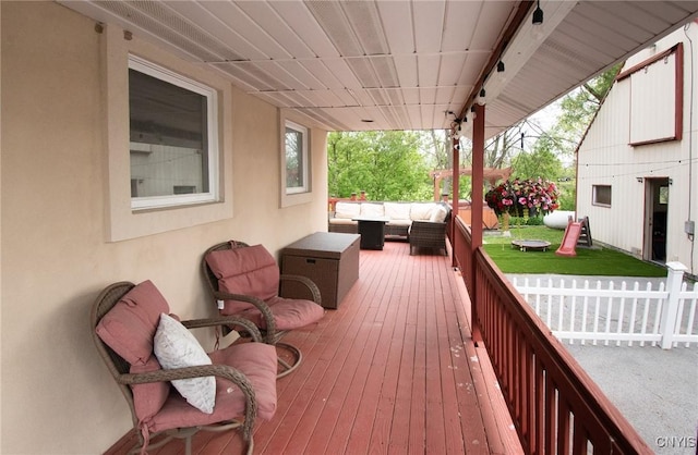 8929 State Route 12e, Lyme, NY 13622 - wooden terrace featuring outdoor lounge area