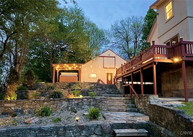8929 State Route 12e, Lyme, NY 13622 - back of property with stairs and a wooden deck