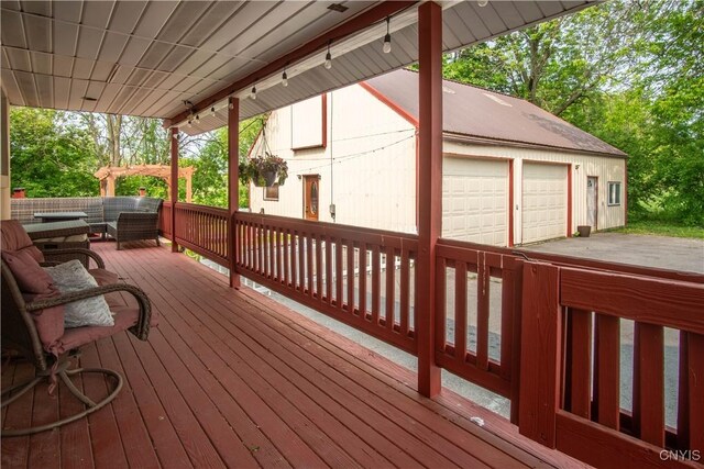 8929 State Route 12e, Lyme, NY 13622 - wooden terrace featuring a garage